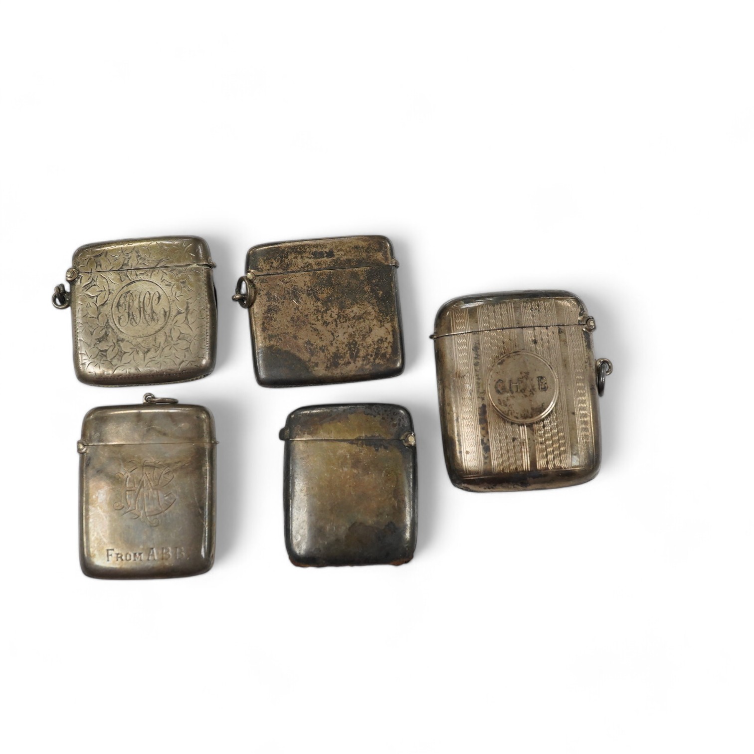 Five assorted late 19th/early 20th century silver vesta cases, largest 58mm. Condition - poor to fair